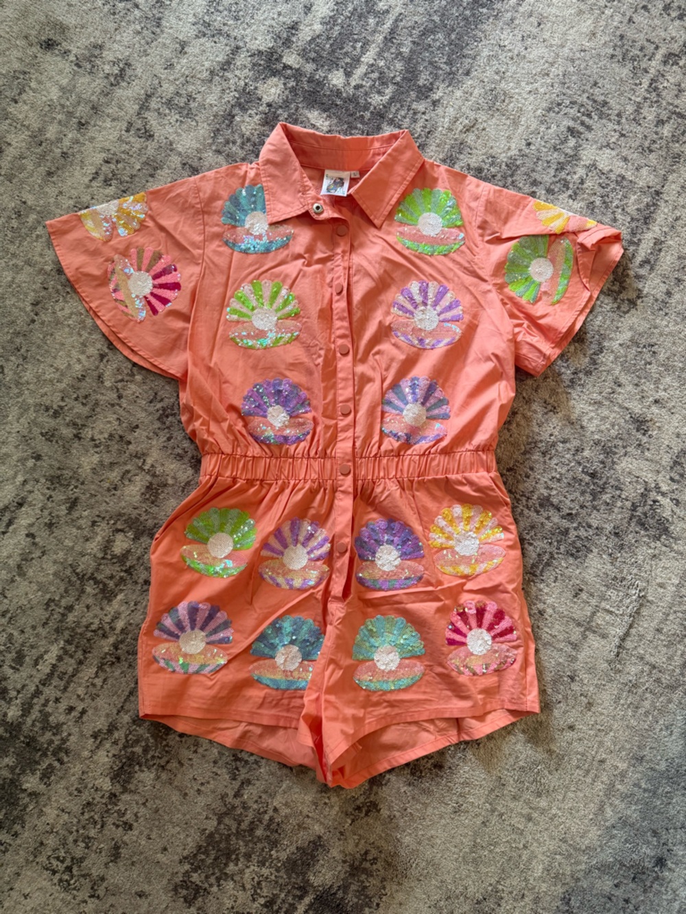 QUEEN OF SPARKLES Coral Sequin Clam Romper